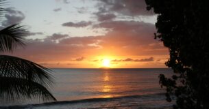 Sunset at Rincon Beach in Puerto Rico - stock photo