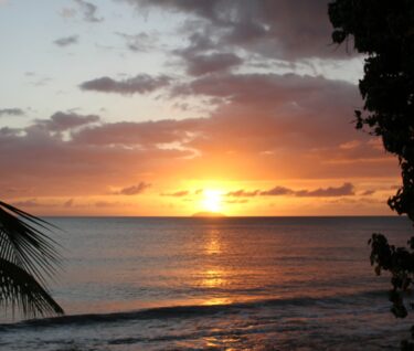 Sunset at Rincon Beach in Puerto Rico - stock photo